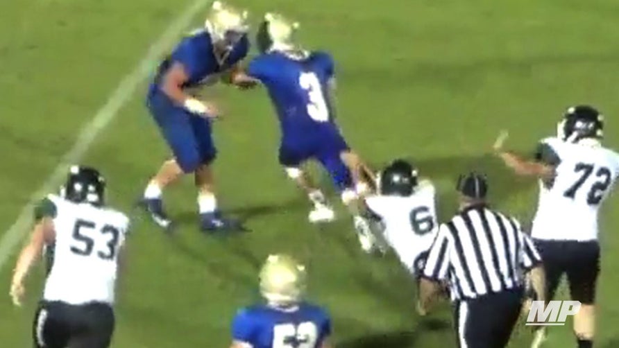 Zach Dodson of Huntingdon (TN) drags a defender over 10 yards and finishes it off by taking it to the house.