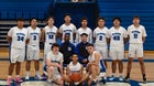 Dexter Demons Boys Varsity Basketball Winter 24-25 team photo.