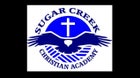 Sugar Creek Christian Academy Eagles Boys Varsity Basketball Winter 24-25 team photo.
