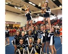 Ruidoso Warriors Co-ed Varsity Cheer Winter 18-19 team photo.