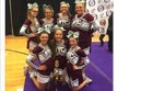 Western Yell County Wolverines Co-ed Varsity Cheer Fall 16-17 team photo.