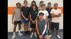 Artesia Bulldogs Boys Varsity Cross Country Fall 26-27 team photo.