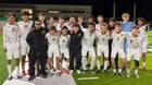 Liberty Lions Boys Varsity Soccer Winter 25-26 team photo.