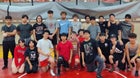 Omaha South Packers Boys Varsity Wrestling Winter 22-23 team photo.