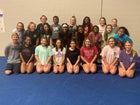 Arkansas Razorbacks Co-ed Varsity Cheer Fall 19-20 team photo.