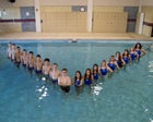 Carlsbad Cavemen Boys Varsity Swimming Winter 16-17 team photo.