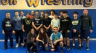 Santa Fe Demons Boys Varsity Wrestling Winter 21-22 team photo.