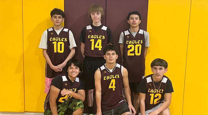 Vaughn Municipal Schools website header with the tagline Soar like an Eagle framed by images of a maroon and gold eagle and a maroon and gold train